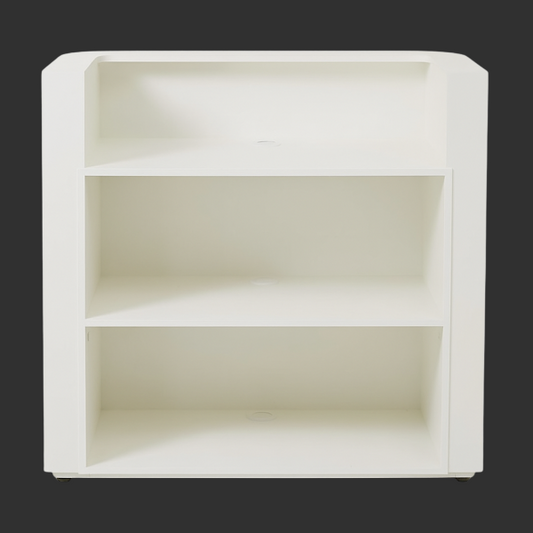 Interior shelving of a white reception desk with three open storage compartments