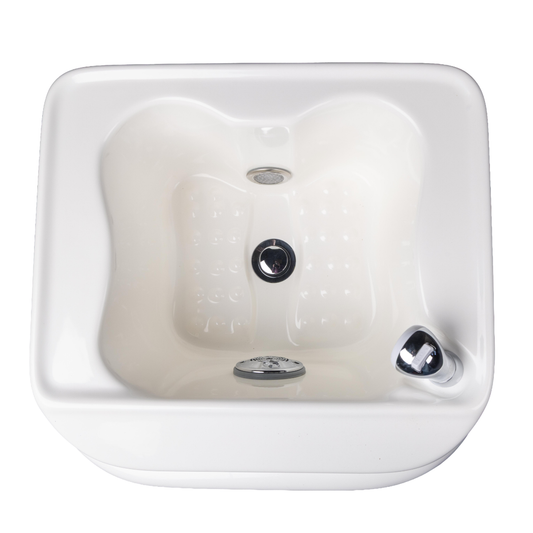 White ceramic sink with three faucet holes on a white background