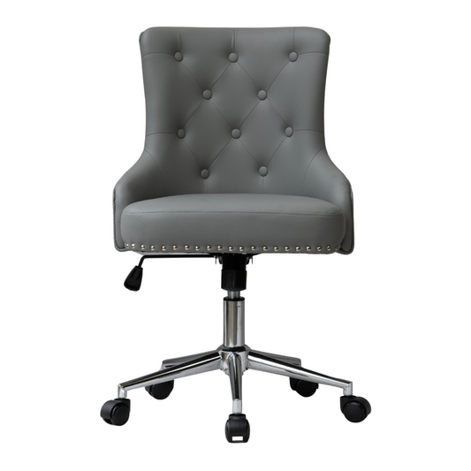 Grey upholstered swivel office chair with button-tufted backrest, curved armrests, decorative nailhead trim along the seat front, and a chrome five-star base with castors and height adjustment lever.