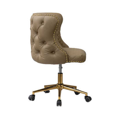 Side view of a beige upholstered chair with button-tufted backrest, gold nailhead trim, and a gold five-star base with caster wheels