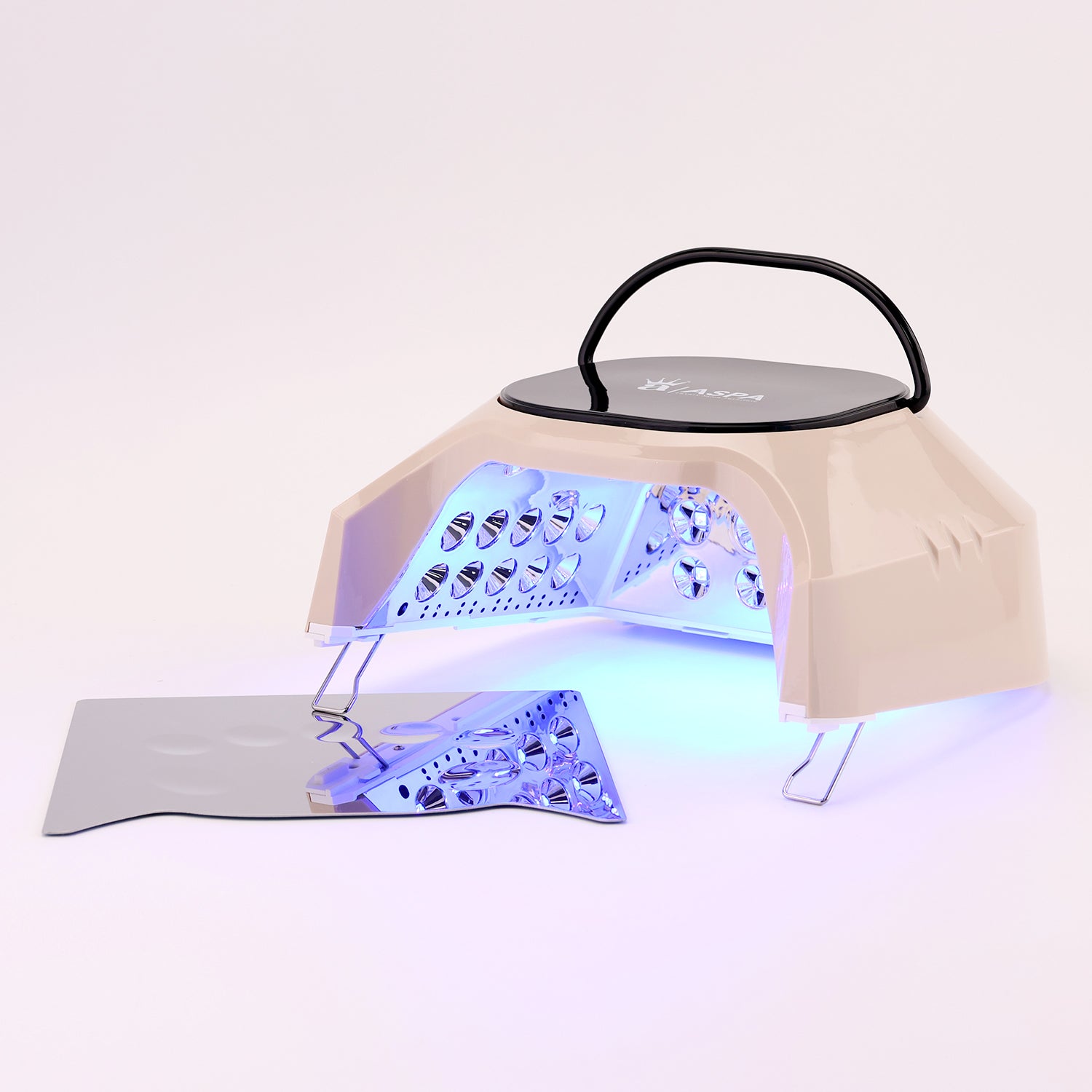 Nail dryer with blue light on a white background