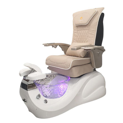 A modern pedicure chair with a white base and gold armrests, featuring a beige seat and backrest with a glass bowl at the footrest section, illuminated by a purple light.