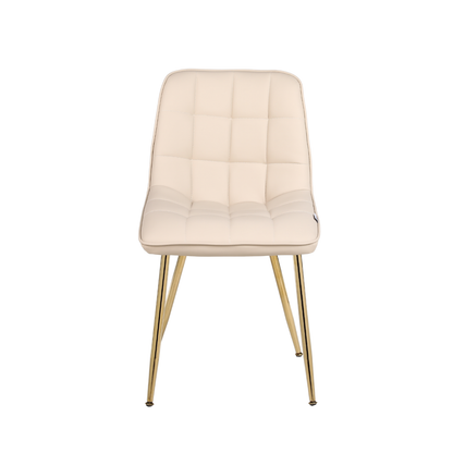Cream chair with gold legs on a white background