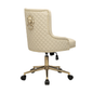 Cream office chair with quilted design and lion emblem on a white background