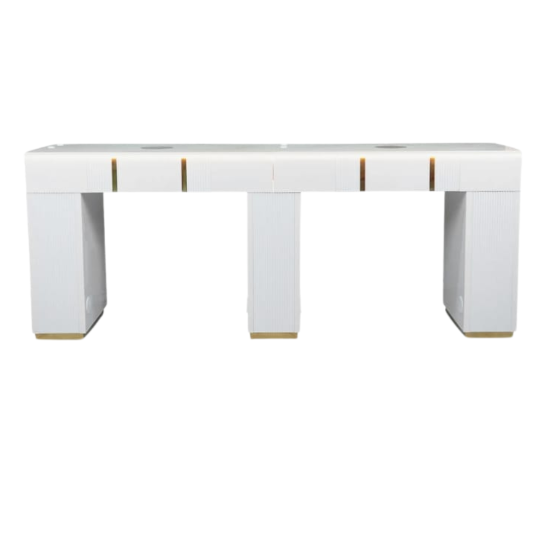 White nail table with gold accents on a white background