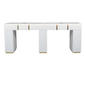 White nail table with gold accents on a white background