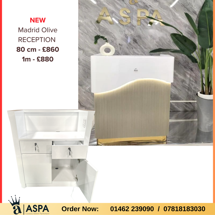 ASPA reception desk with marble wall and plant in a showroom setting