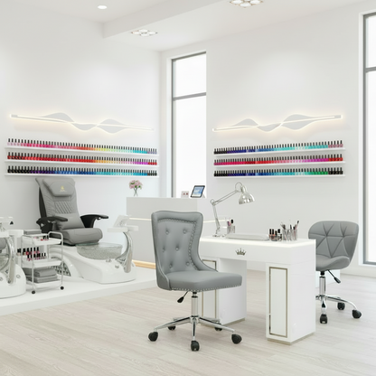 Modern salon interior with gray chairs, white desk, and colorful shelves.