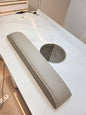 Nail table headrest with filter grille on a white background