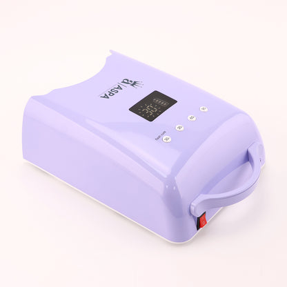 Purple nail dryer with digital display on a white background with hand hold and on off button