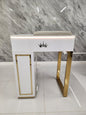 White and gold nail table size 65cm with a crown emblem on a marble background
