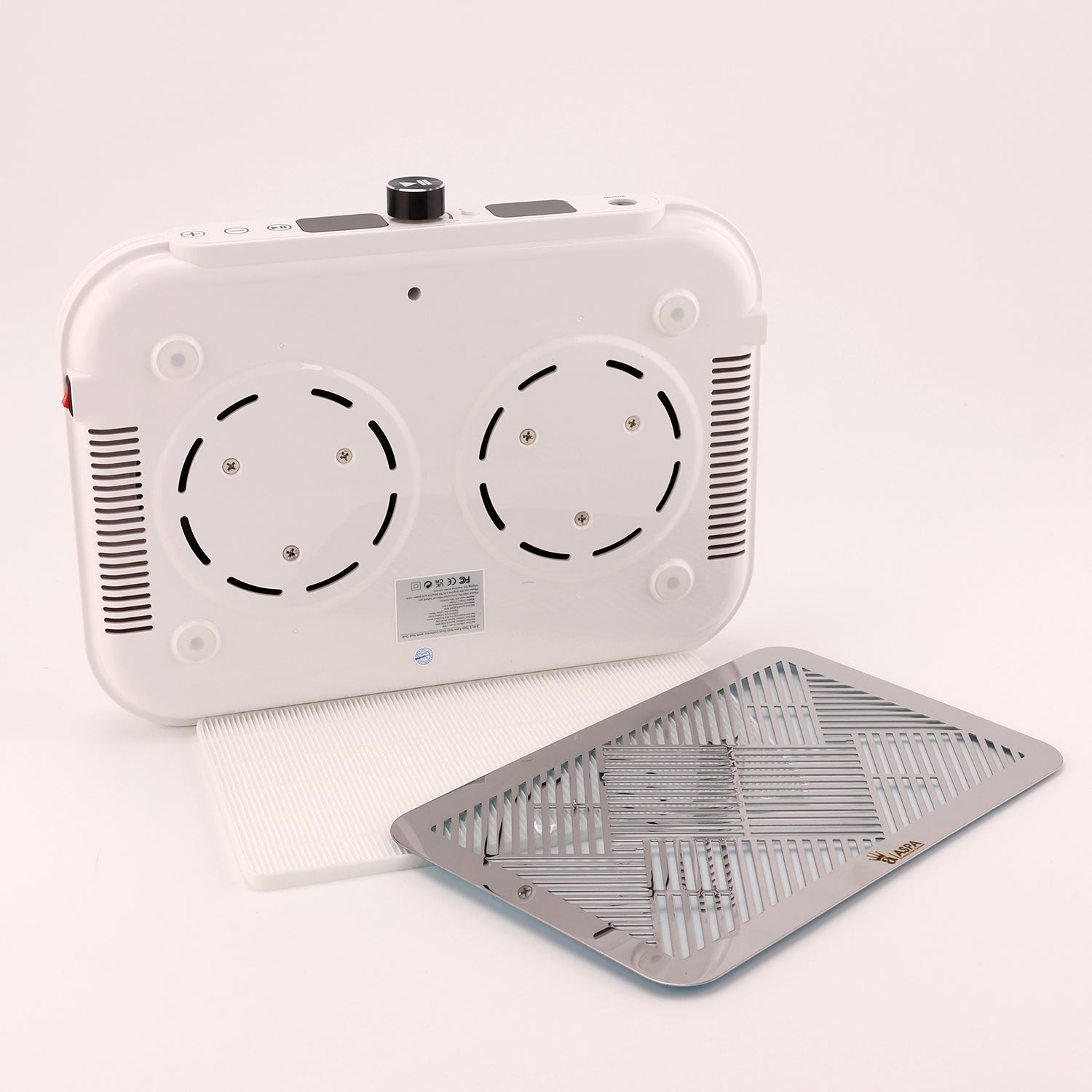 White electronic device with cooling fans and a heating pad on a light gray background