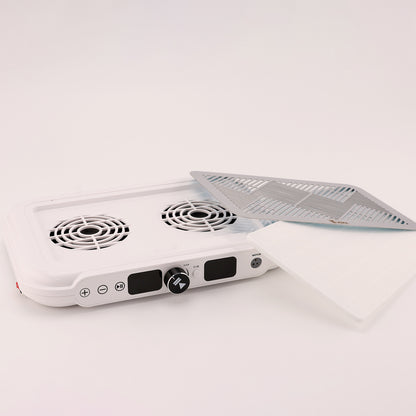 White electronic device with cooling fans on a light gray background