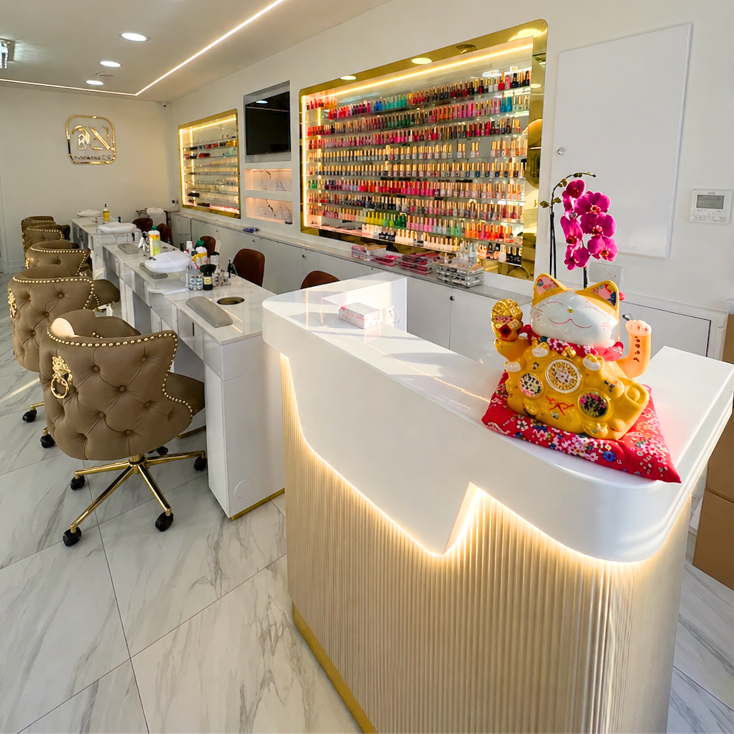 Reception valentino olive with other salon furniture inside the nail salon
