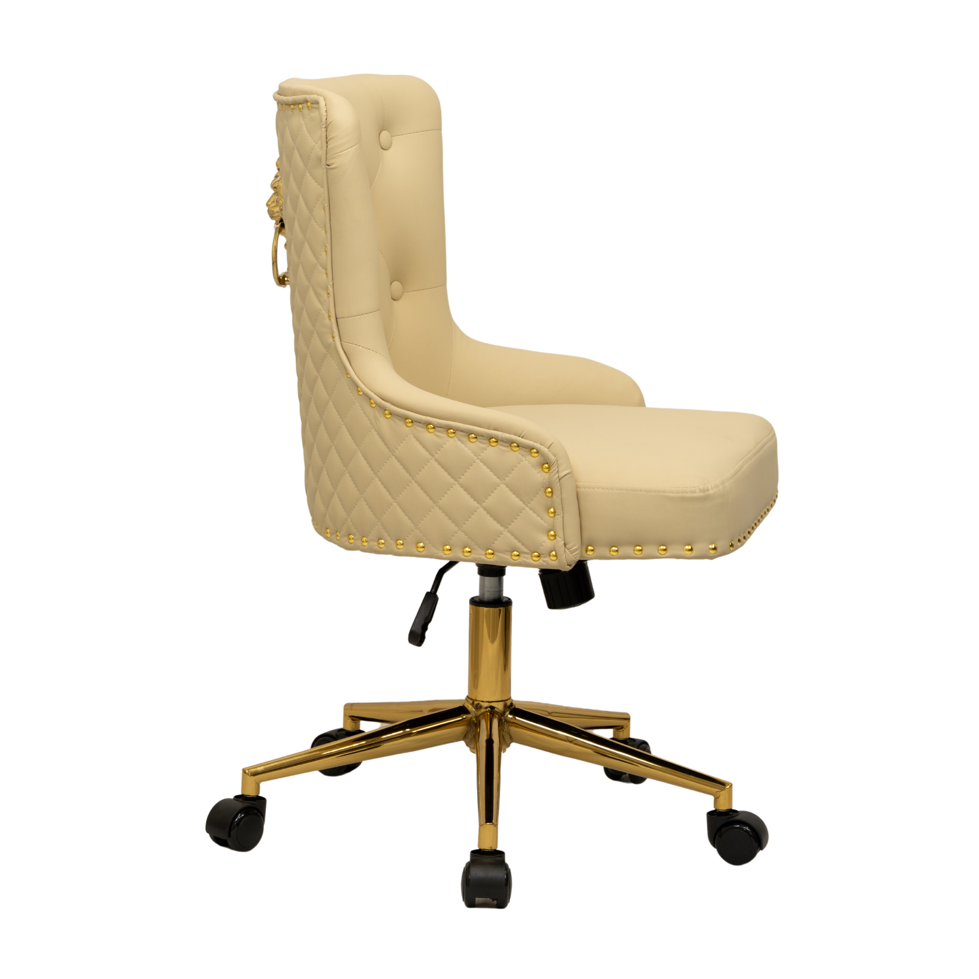Side view of a beige upholstered swivel office chair with button-tufted backrest, diamond-quilted side panels, gold nailhead trim along the edges, curved padded arms, and a gold five-star base with castors and height adjustment lever.